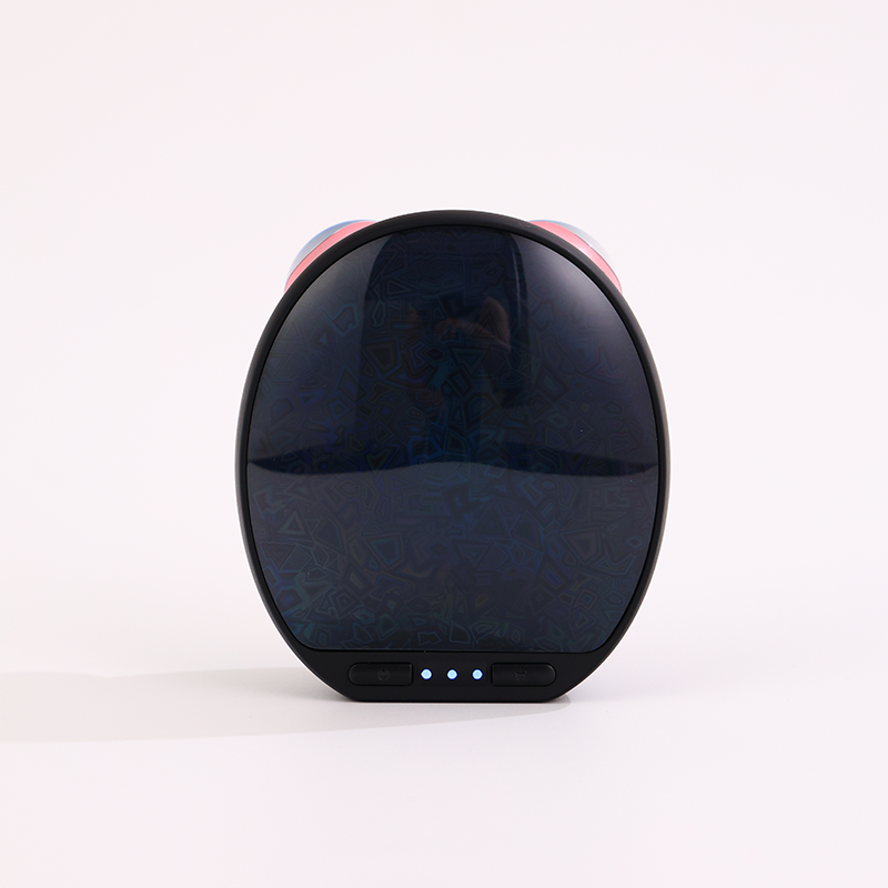 Black round electronic device with a reflective surface on a white background